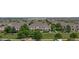 Beautifully landscaped community of modern townhomes with lush green spaces and mature trees at 9758 Laredo St # 22D, Commerce City, CO 80022