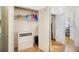 Organized walk-in closet with ample shelving and drawers for storage solutions at 2958 Syracuse St # 403, Denver, CO 80238