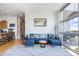 Spacious living room with an open layout and large windows for natural light at 2958 Syracuse St # 403, Denver, CO 80238