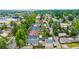 Aerial view of a residential neighborhood with lush greenery and diverse architecture at 2676 S Lincoln St, Denver, CO 80210