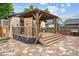 Backyard featuring wooden deck, gazebo, patio, and wooden fencing at 2676 S Lincoln St, Denver, CO 80210