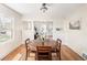 The dining room offers natural light and open access to living room and front entryway at 2676 S Lincoln St, Denver, CO 80210
