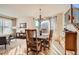 Dining room with hardwood floors and a chandelier at 20942 E Hampden Pl, Aurora, CO 80013