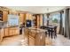 Spacious kitchen with stainless steel appliances and a large island at 20942 E Hampden Pl, Aurora, CO 80013