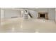 Spacious finished basement area featuring a brick fireplace and staircase at 1840 E 84Th Ave, Denver, CO 80229