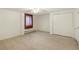 Cozy bedroom with carpet features a window and closet for storage at 1840 E 84Th Ave, Denver, CO 80229