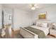 Comfortable bedroom with a queen-size bed, soft lighting, and neutral décor at 1840 E 84Th Ave, Denver, CO 80229