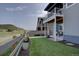 Spacious backyard with artificial turf, perfect for outdoor activities and enjoying the natural landscape at 527 Felicity Loop, Castle Rock, CO 80109
