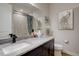 Bathroom with grey vanity, grey countertop, square sink and modern fixtures and decorative accents at 527 Felicity Loop, Castle Rock, CO 80109