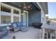 Inviting outdoor deck with comfortable seating, ceiling fan, and a grill for outdoor cooking and relaxation at 527 Felicity Loop, Castle Rock, CO 80109