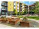 Beautiful courtyard with garden plots and seating in an apartment complex at 2829 W 53Rd Ave # 104, Denver, CO 80221