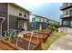 Townhomes with garden plots and seating areas in a courtyard at 2829 W 53Rd Ave # 104, Denver, CO 80221