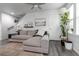 Cozy living room with comfortable seating, natural light, and stylish decor at 2829 W 53Rd Ave # 104, Denver, CO 80221