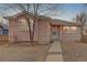 Charming home with a walkway, well-maintained lawn, and curb appeal at 1777 Willow St, Denver, CO 80220