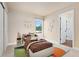 Cozy bedroom with a comfortable bed and closet space at 10294 Spotted Owl Ct, Highlands Ranch, CO 80129