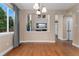 Bright dining room with hardwood floors, large window and an open layout perfect for entertaining at 10294 Spotted Owl Ct, Highlands Ranch, CO 80129