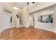 Inviting foyer with hardwood floors and a staircase leading to the upper level at 10294 Spotted Owl Ct, Highlands Ranch, CO 80129