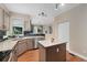Well-designed kitchen with stainless appliances, ample counter space, and a functional center island at 10294 Spotted Owl Ct, Highlands Ranch, CO 80129