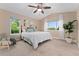Serene main bedroom featuring large windows and comfortable furnishings at 10294 Spotted Owl Ct, Highlands Ranch, CO 80129