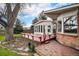 Backyard patio and deck with ample seating, an inviting outdoor space for relaxation and entertainment at 3285 Balsam St, Wheat Ridge, CO 80033
