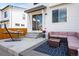 Outdoor patio area with comfortable seating and a hammock at 5347 Osceola St, Denver, CO 80212