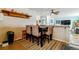 Cozy dining area with tiled floors, neutral accents, and seating for six at 1492 S Cathay St, Aurora, CO 80017