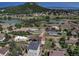 Breathtaking aerial view of home near a tranquil lake, showcasing its serene surroundings and neighborhood at 265 Upper Glenway, Palmer Lake, CO 80133