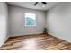 Empty bedroom with a view and light-colored wood floors at 265 Upper Glenway, Palmer Lake, CO 80133