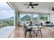 Open dining area with mountain views, modern furniture, and access to an outdoor deck at 265 Upper Glenway, Palmer Lake, CO 80133