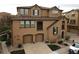 Beautiful three story home featuring a well maintained lawn and a two car garage at 10546 Graymont Ln # D, Highlands Ranch, CO 80126