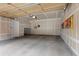 Spacious garage with a door to inside, ready for storage or hobbies at 10546 Graymont Ln # D, Highlands Ranch, CO 80126
