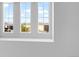 Bright room featuring three windows offering neighborhood views and ample natural light at 10546 Graymont Ln # D, Highlands Ranch, CO 80126
