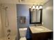 Bathroom featuring vanity with granite countertop at 2929 W Floyd Ave # 217, Denver, CO 80236