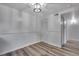 Bedroom features modern floors and a closet, providing essential storage space at 2929 W Floyd Ave # 217, Denver, CO 80236