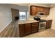 This kitchen features granite countertops and stainless steel appliances at 2929 W Floyd Ave # 217, Denver, CO 80236