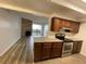 This kitchen features granite countertops and stainless steel appliances at 2929 W Floyd Ave # 217, Denver, CO 80236