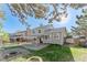 Large backyard featuring a lawn, and mature trees at 4249 S Biscay Cir, Aurora, CO 80013