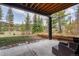 Outdoor patio area offering mountain views and providing a relaxed seating arrangement at 581 Fairview Blvd, Breckenridge, CO 80424