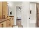 Hallway view of bathroom with shower over the tub and a modern vanity area at 581 Fairview Blvd, Breckenridge, CO 80424