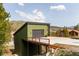 Modern garage with an attached deck and mountain views at 581 Fairview Blvd, Breckenridge, CO 80424
