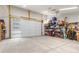 Spacious two car garage with storage shelves and ample space for vehicles and projects at 581 Fairview Blvd, Breckenridge, CO 80424
