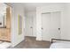 Hallway featuring neutral walls and carpets that leads to a bedroom and bathroom at 581 Fairview Blvd, Breckenridge, CO 80424