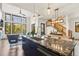 Spacious kitchen featuring a large island, modern appliances, and an open view to the living area at 581 Fairview Blvd, Breckenridge, CO 80424