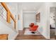 Cozy sitting area with hardwood floors, orange swivel chairs, and modern decor, great for relaxing at 581 Fairview Blvd, Breckenridge, CO 80424
