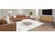 Comfortable living room featuring stylish furniture, modern decor, and wood flooring at 1200 N Humboldt St # 604, Denver, CO 80218