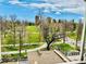 Beautiful park view with trees, green space, walking paths, and city buildings in the background at 1200 N Humboldt St # 604, Denver, CO 80218