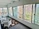 Relaxing patio area featuring furniture, rugs, and bright airy views to the outside at 1200 N Humboldt St # 604, Denver, CO 80218