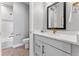 Bright bathroom featuring a glass enclosed shower and a vanity with modern fixtures at 5591 Farrier Pt, Castle Rock, CO 80104