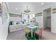 Inviting bedroom with colorful decor, including a daybed, playful seating, and a striped accent wall at 5591 Farrier Pt, Castle Rock, CO 80104