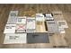 Selection of interior design material samples including flooring, countertops, tiles, and paint colors at 5591 Farrier Pt, Castle Rock, CO 80104
